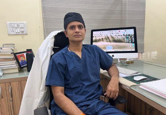 Dr. Sandeep Mahapatra performing a dermatology procedure